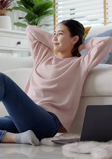 a young woman sitting in a living room